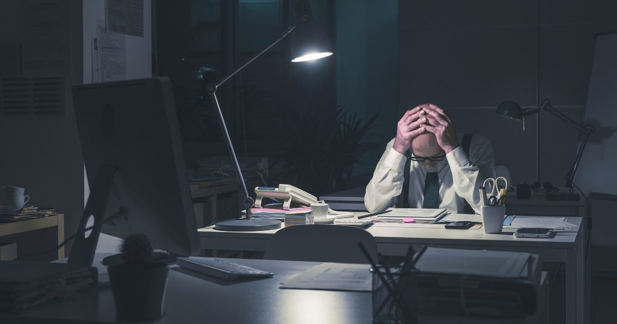 Executive reviewing cybersecurity compliance certification documents